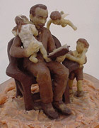 Detalle de la escultura «Martí y los niños» (cera/madera/metal), 42x52x25 cmt (2003) de la artista Isabel Santos Rojo
